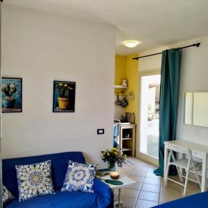 Posezení v ubytování Dépendance in Villa Siciliana + 30 fotografií