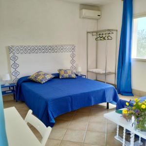 Postel nebo postele na pokoji v ubytování Dépendance in Villa Siciliana