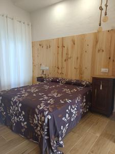 Postel nebo postele na pokoji v ubytování Apartamentos La Muralla + 37 fotografií