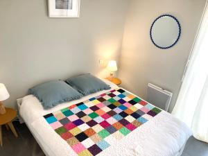 Postel nebo postele na pokoji v ubytování Appart à 200m de la plage de Contis