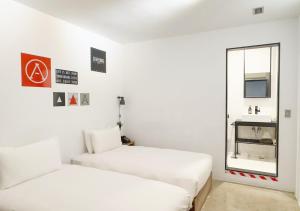 Voodi või voodid majutusasutuse ART'OTEL Ximending TAIPEI toas