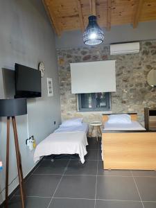 Posteľ alebo postele v izbe v ubytovaní V&M Traditional Luxury Villa
