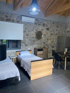 Posteľ alebo postele v izbe v ubytovaní V&M Traditional Luxury Villa