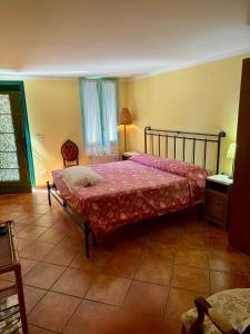 Postel nebo postele na pokoji v ubytování Casetta n.2 con piscina