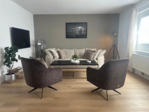 A television and/or entertainment centre at FACT Apartments Még 37 kép