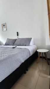 Aparta-Suite Dúplex de Lujo客房内的一张或多张床位