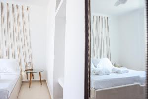 Ένα ή περισσότερα κρεβάτια σε δωμάτιο στο Studio near Paraportiani Mykonos Town +7 φωτογραφίες