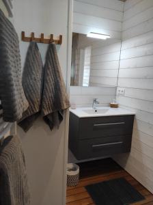 Baðherbergi á Chambre Perchée avec vue imprenable sur le lac de Lacanau