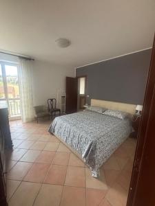 Ένα ή περισσότερα κρεβάτια σε δωμάτιο στο La casa di Stina