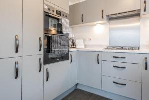 Kuchyň nebo kuchyňský kout v ubytování Harbour place in Cheshire East