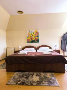 Letto o letti in una camera di Hotel Delfin