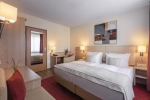 Postel nebo postele na pokoji v ubytování Garner Hotel Hamburg - Wandsbek Marktplatz by IHG