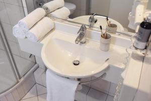 Koupelna v ubytování Garner Hotel Hamburg - Wandsbek Marktplatz by IHG