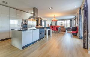 an open kitchen and living room in a house at Beautiful Home In Cox in Cox