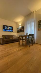 TV a/nebo společenská místnost v ubytování Orvieto Residence