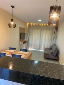 Posezení v ubytování Condomínio Aliete Mendes