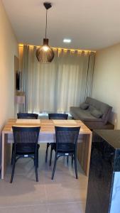 Posezení v ubytování Condomínio Aliete Mendes + 4 fotografie