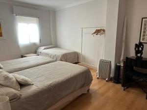 Posteľ alebo postele v izbe v ubytovaní Céntrico Apartamento en Ronda
