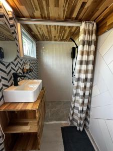a bathroom with a sink and a shower at Beachfront Tiny House, Koh Samui, Thailand with FREE Rowboat in Amphoe Koh Samui +25 photos