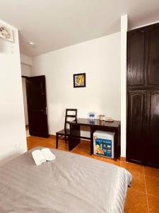 Letto o letti in una camera di Ruby Căn hộ Dịch vụ Khách sạn