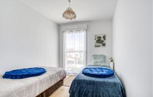 Ένα ή περισσότερα κρεβάτια σε δωμάτιο στο Beautiful Apartment In La Tremblade