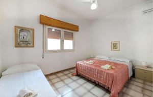Ένα ή περισσότερα κρεβάτια σε δωμάτιο στο Amazing Home In San Pietro In Bevagna