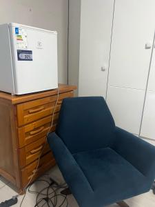 Et opholdsområde på Suíte com entrada independente Pelotas