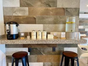 Příslušenství pro přípravu čaje a kávy v ubytování Hotel Star