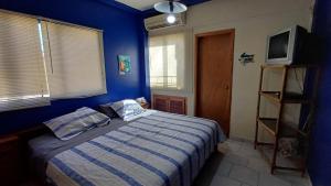 TV a/nebo společenská místnost v ubytování Lindo apartamento en Morrocoy con piscina y WiFi