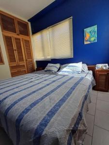 Postel nebo postele na pokoji v ubytování Lindo apartamento en Morrocoy con piscina y WiFi + 14 fotografií
