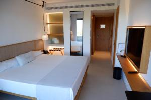 Postel nebo postele na pokoji v ubytování Hotel Serawa Moraira