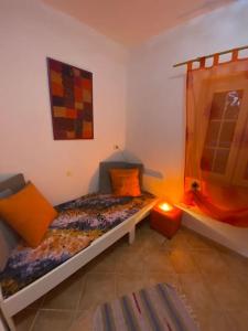 Ένα ή περισσότερα κρεβάτια σε δωμάτιο στο Le Tre Ghinee