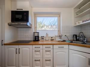 Η κουζίνα ή μικρή κουζίνα στο Brigitte App 1 West