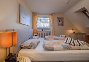 Ένα ή περισσότερα κρεβάτια σε δωμάτιο στο Brigitte App 1 West