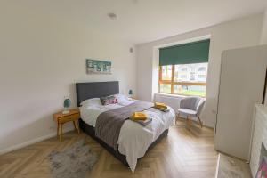 Letto o letti in una camera di The Piggery
