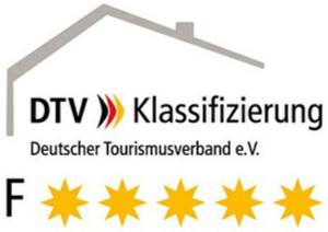 Ein Zertifikat, Auszeichnung, Logo oder anderes Dokument, das in der Unterkunft Ferienwohnung Lieblingssuite am Strand ausgestellt ist