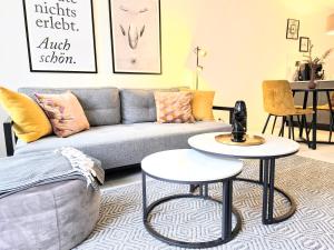 Ein Sitzbereich in der Unterkunft Ferienwohnung Lieblingssuite am Strand
