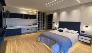 a bedroom with a large bed in a room at Santa Justa Bedrooms in Lisbon