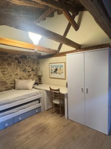 Ein Bett oder Betten in einem Zimmer der Unterkunft La Casita de Verdiago