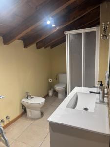 Ein Badezimmer in der Unterkunft La Casita de Verdiago
