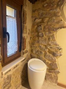 Ein Badezimmer in der Unterkunft La Casita de Verdiago