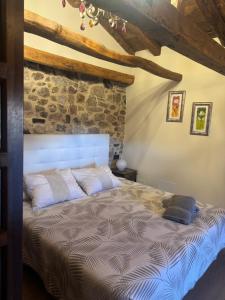 Ein Bett oder Betten in einem Zimmer der Unterkunft La Casita de Verdiago