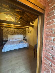 Ein Bett oder Betten in einem Zimmer der Unterkunft La Casita de Verdiago