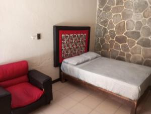 Postel nebo postele na pokoji v ubytování Hotel China Poblana