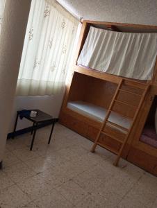 Postel nebo postele na pokoji v ubytování Hotel China Poblana