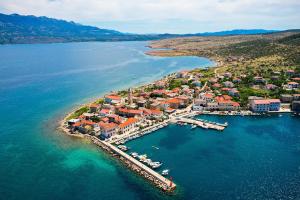 an aerial view of a small island in the water at Villa Rocco in Vinjerac +4 photos