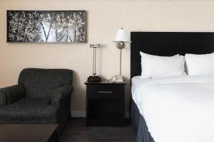 Ліжко або ліжка в номері Hotel Ruby Foo's