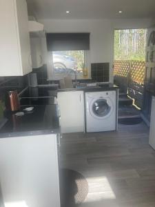 Kuchyň nebo kuchyňský kout v ubytování River View Lodge