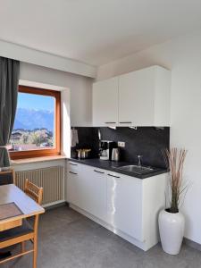 Η κουζίνα ή μικρή κουζίνα στο Residence Rebgut