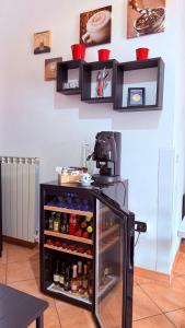 a food cart in a room with food at B&B Vanvitelli Home in Caserta +34 photos